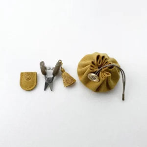 Sett med minisaks og pouch