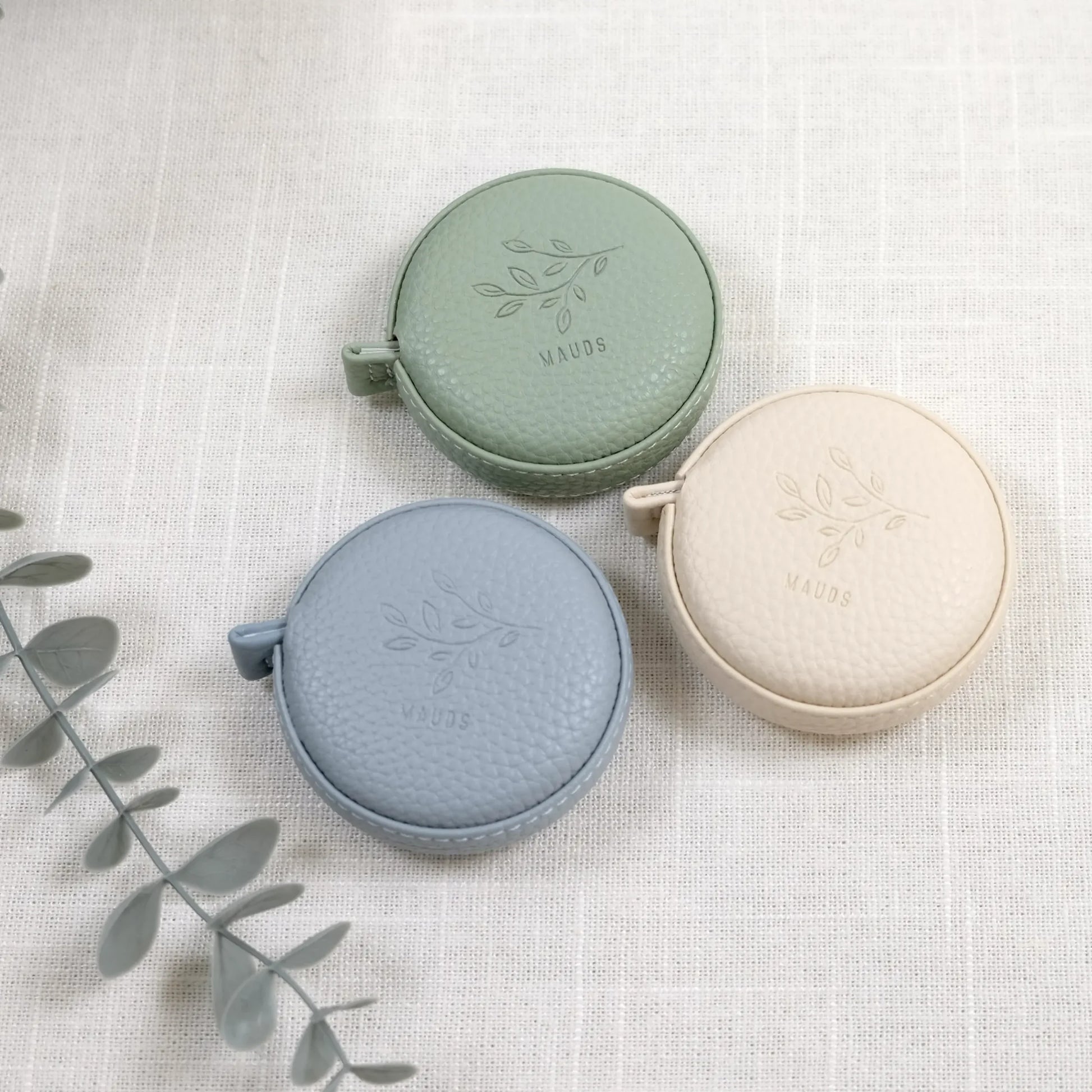 3 målebånd i ulike farger