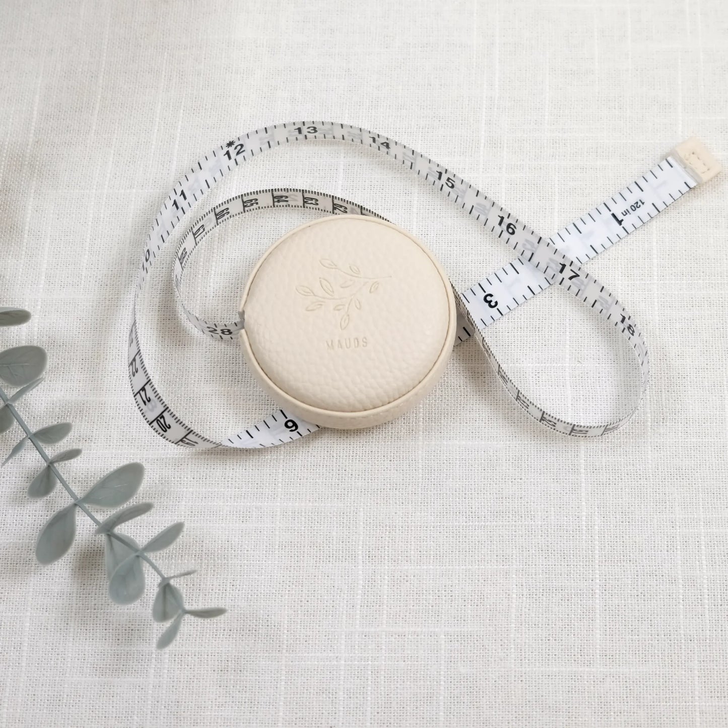 Målebånd kremfarget